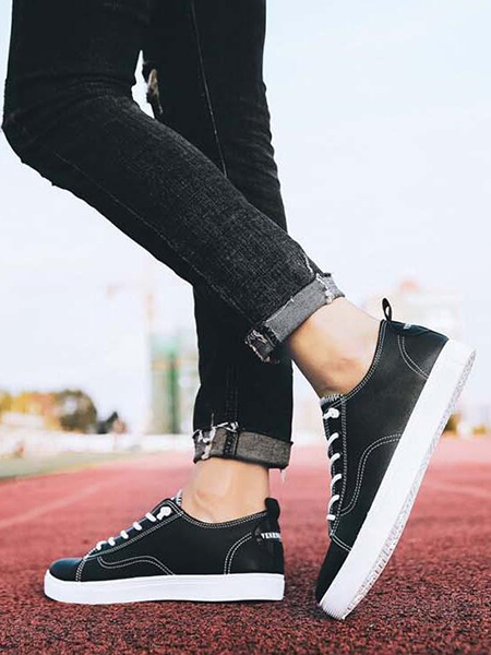 black and white rubber shoes