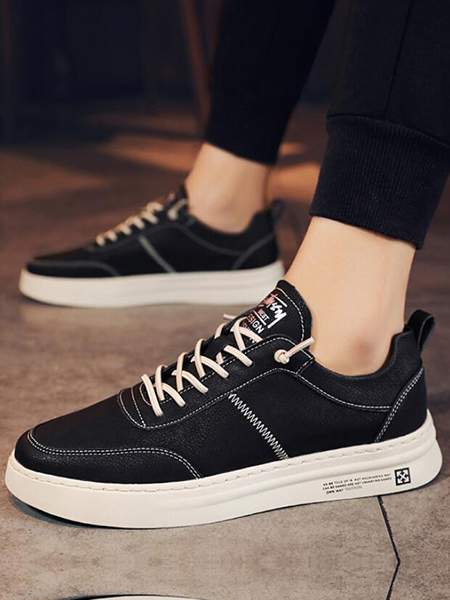 black and white rubber shoes