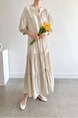 Korean Chic French Round Neck Puff Sleeve Cake Skirt Loose Single-Breasted Long Short-Sleeved Dress for Women in Cream Beige