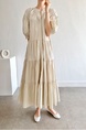 Korean Chic French Round Neck Puff Sleeve Cake Skirt Loose Single-Breasted Long Short-Sleeved Dress for Women in Cream Beige