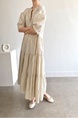 Korean Chic French Round Neck Puff Sleeve Cake Skirt Loose Single-Breasted Long Short-Sleeved Dress for Women in Cream Beige