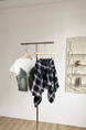 Korean Retro Plaid Strap Irregular Skirt in Black and White