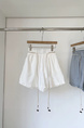 Korean Elastic Waist Stitching Lace Casual Shorts in White – New Summer Holiday Style with Sweet Beaded Belt