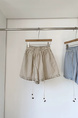 Korean Elastic Waist Stitching Lace Casual Shorts in Beige – New Summer Holiday Style with Sweet Beaded Belt