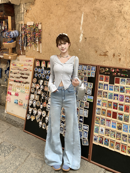 New Elastic Flared Denim Trousers for Women in Light Wash Blue
