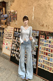 New Elastic Flared Denim Trousers for Women in Light Wash Blue