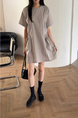 Korean Chic Niche Round Neck Loose Big Pocket Dress in Beige