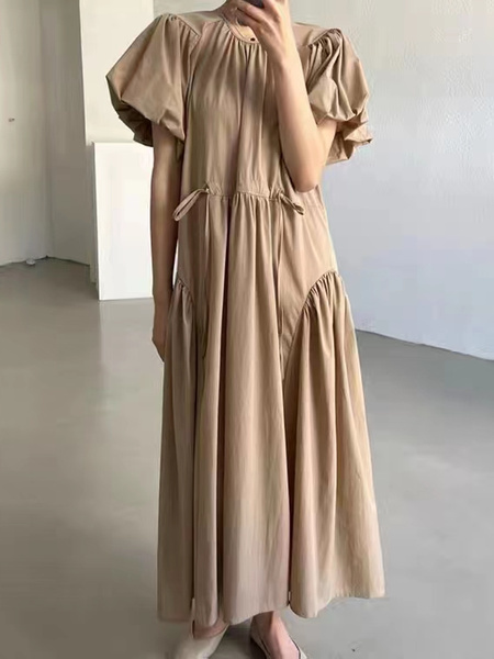 Artistic retro design, simple and fashionable long dress in beige